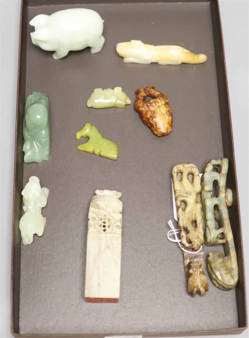 Six Chinese jade and hardstone animal carvings, two dragon belt hooks, a rams head and a soapstone seal, 10cm